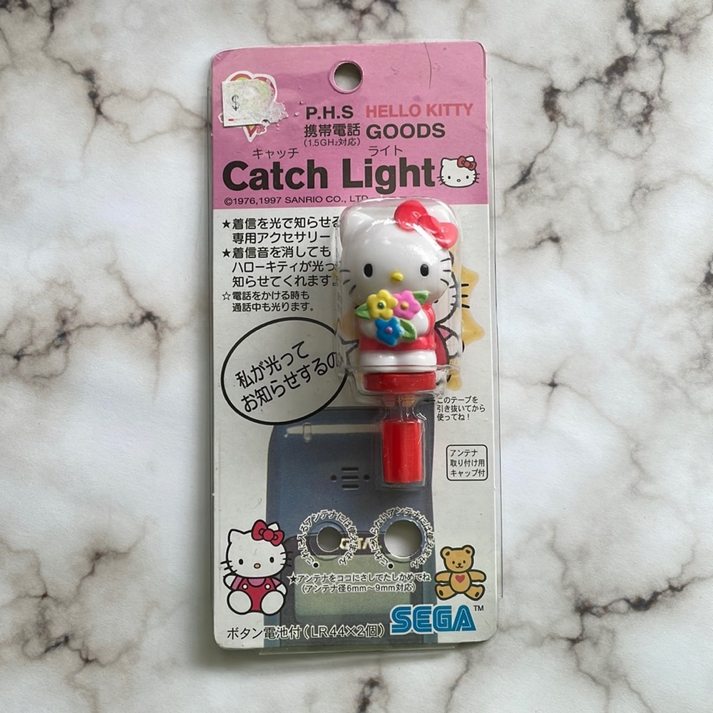 Vintage Sanrio Hello Kitty - cellphone catch light